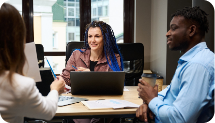 Group of business people working at a table