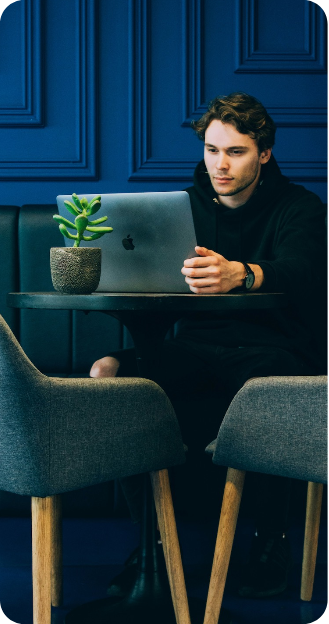 A man working on laptop.